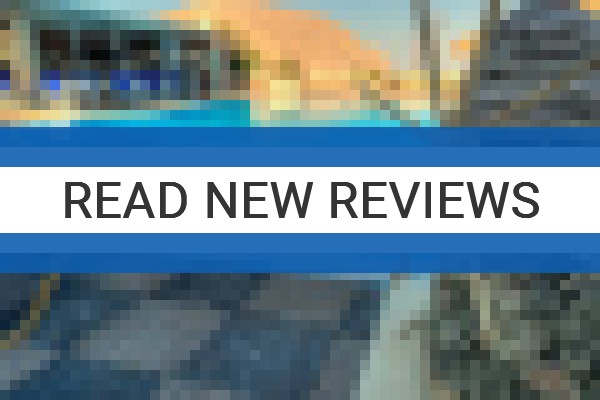 www.perivolossandyvillage.com - check out latest independent reviews